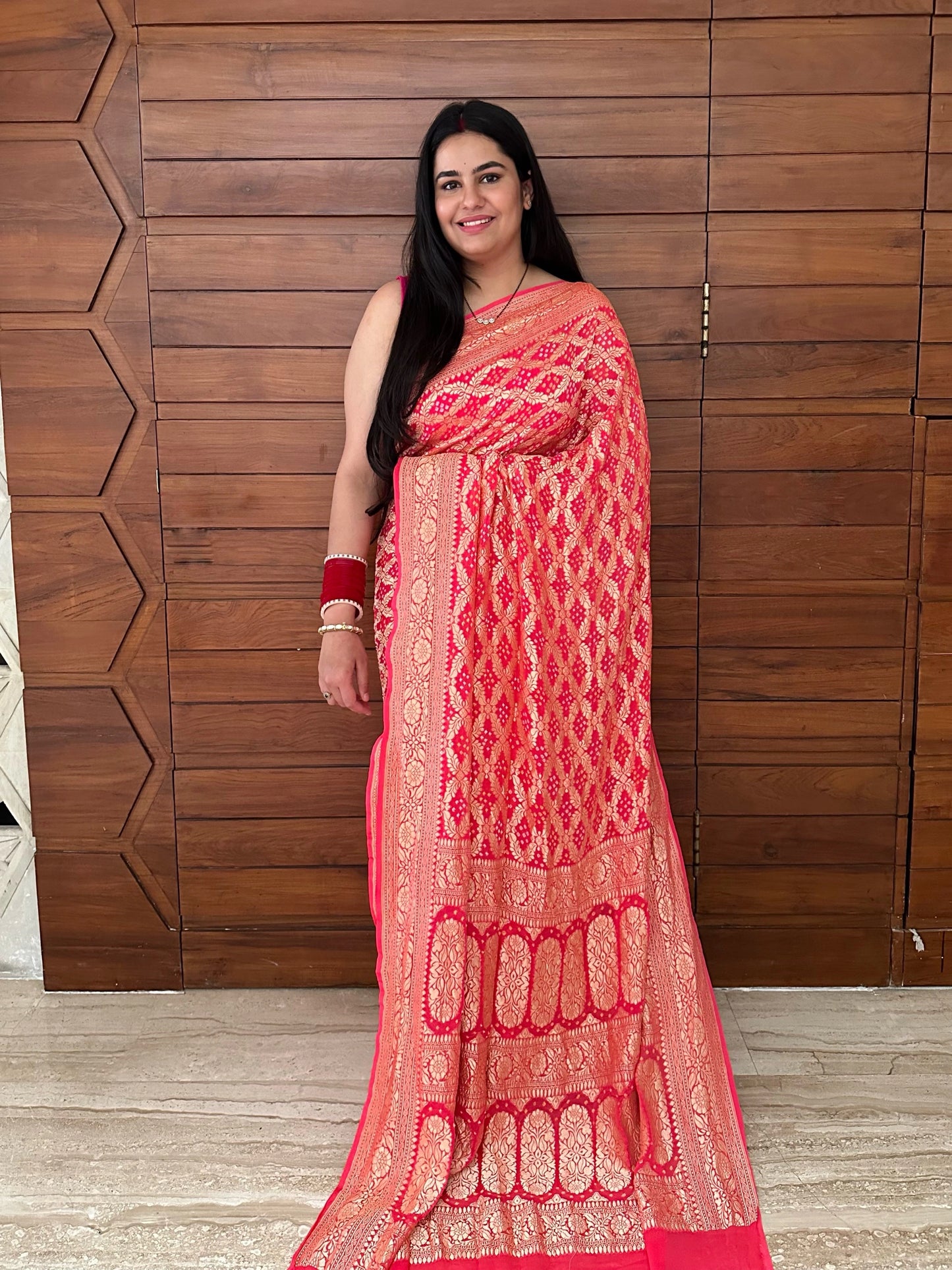 Coral Pink Gharchola Bandhej Pure Georgette Saree