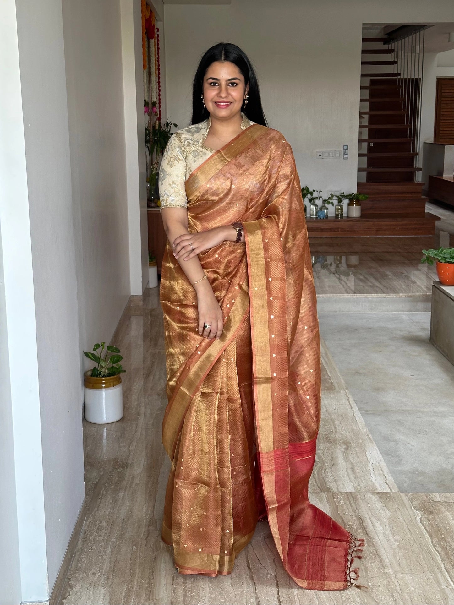Rust Orange Emboss Tissue Silk Saree