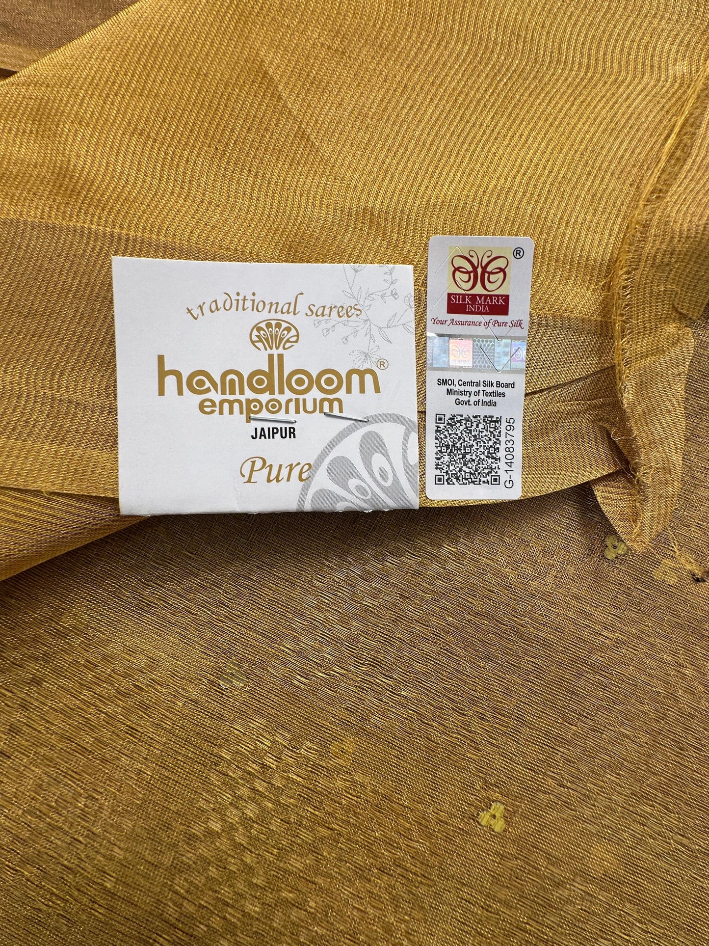 Mustard Emboss Pure Tissue Silk Saree