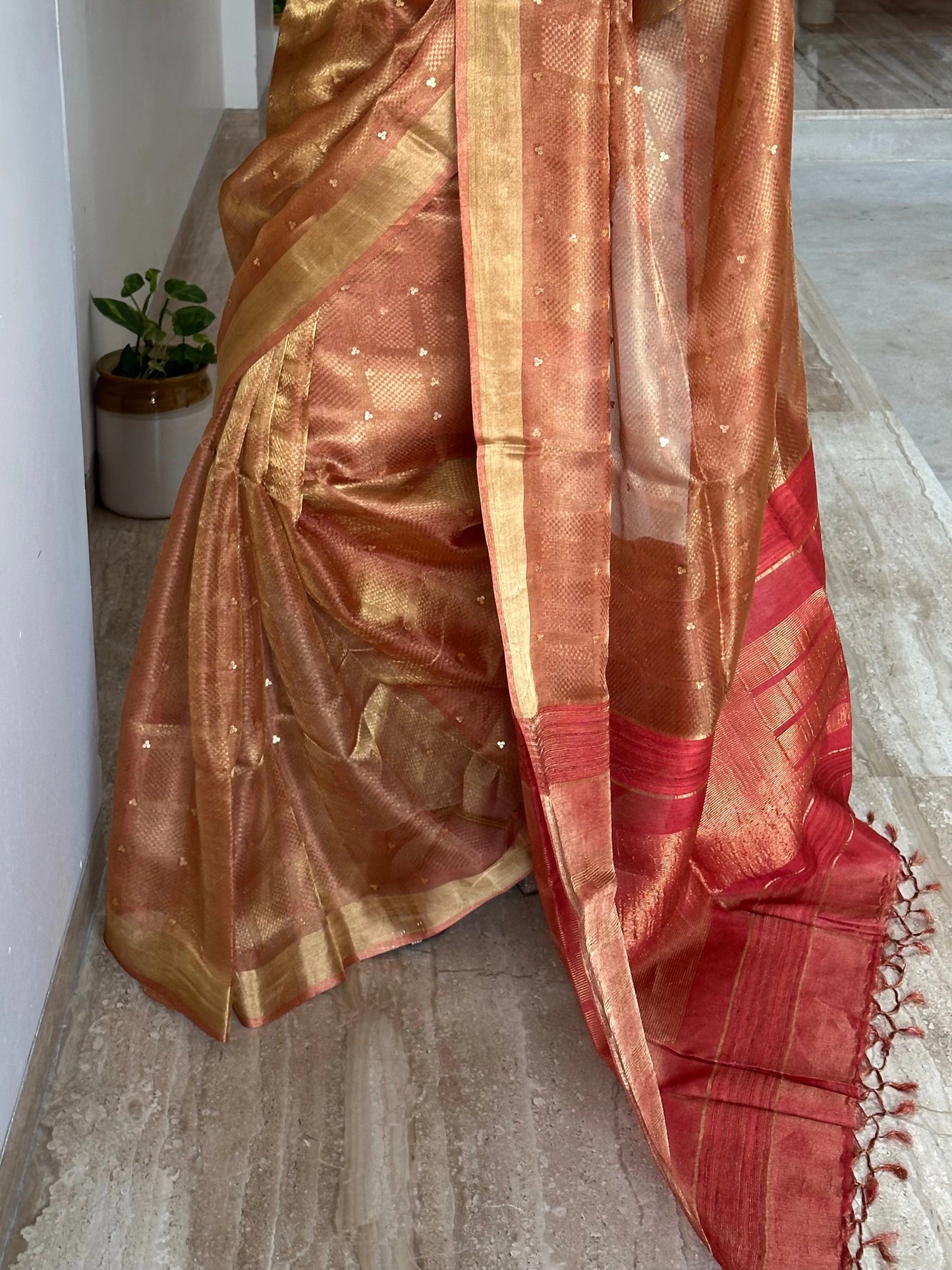 Rust Orange Emboss Tissue Silk Saree