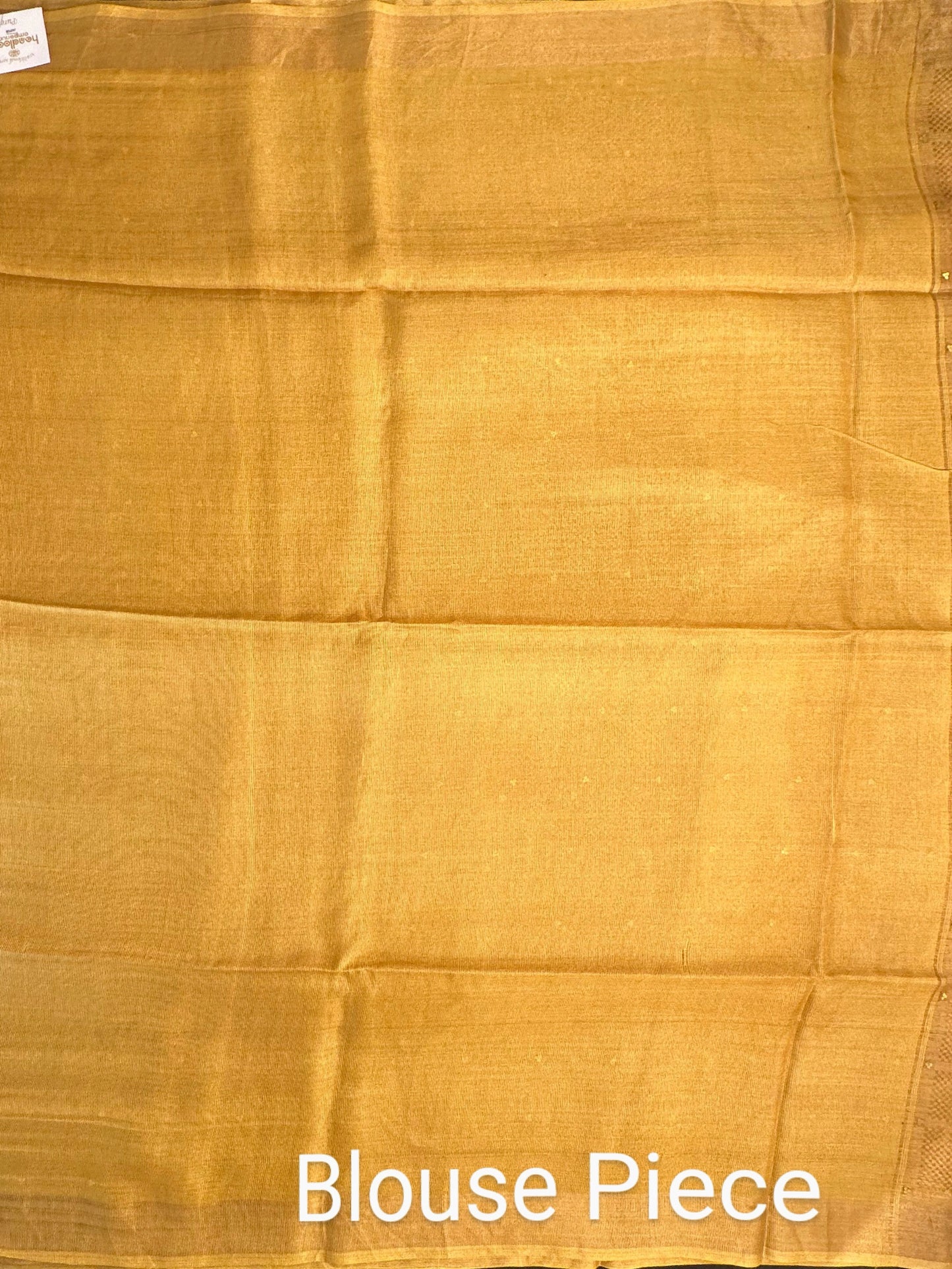 Mustard Emboss Pure Tissue Silk Saree