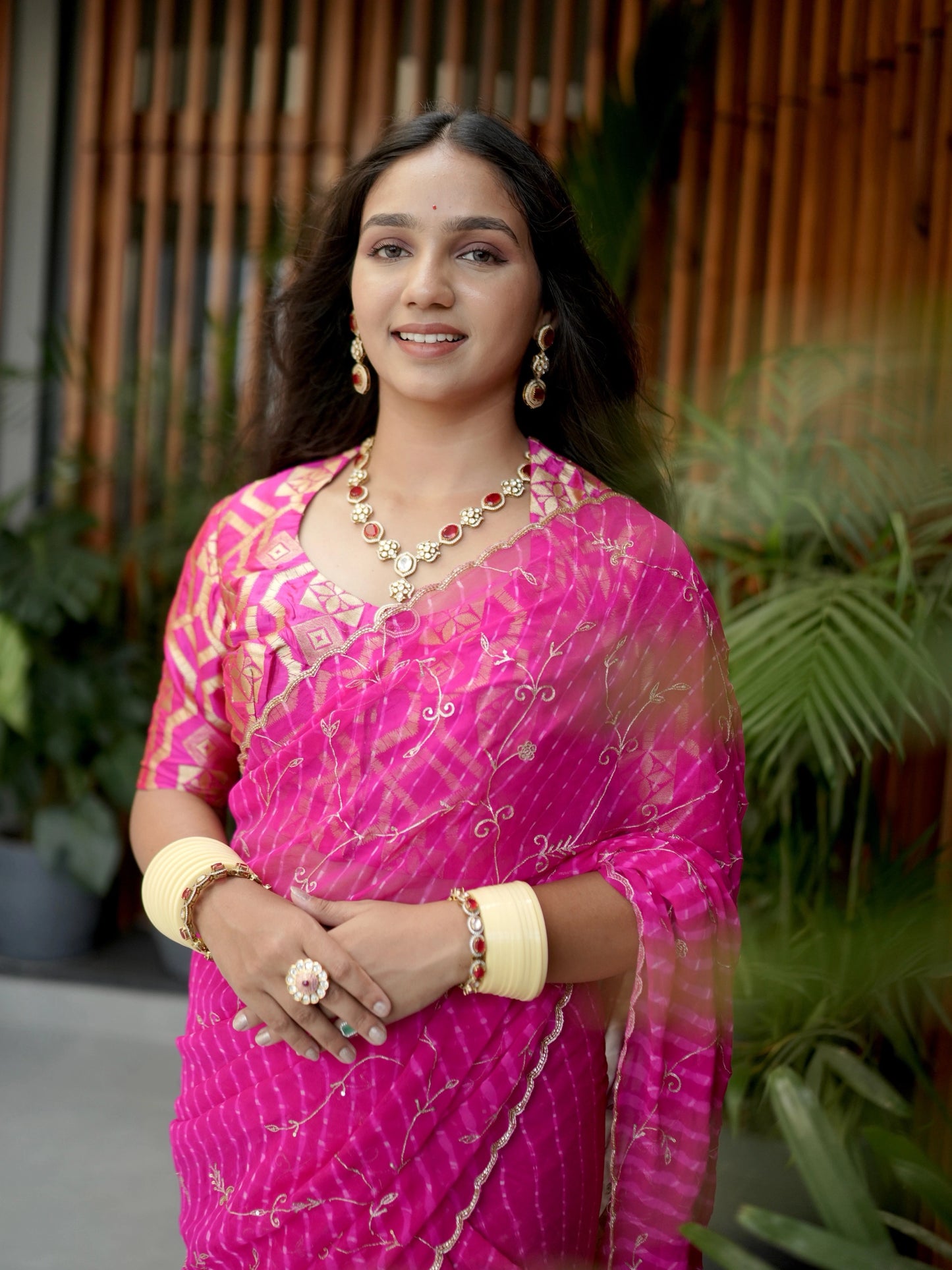Rani Pink Pure Georgette Motra Saree With Aari Work